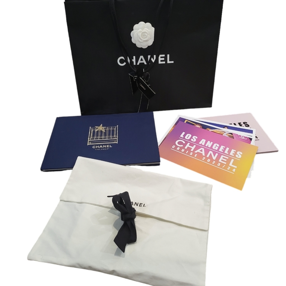 Chanel Boutique Bag, Garment Pouch, and Books